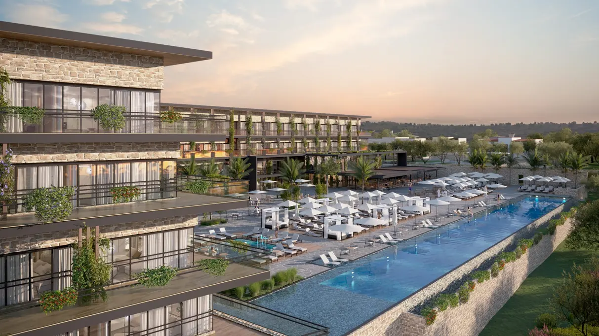 The Gordonia hotel and its infinity pool at dusk