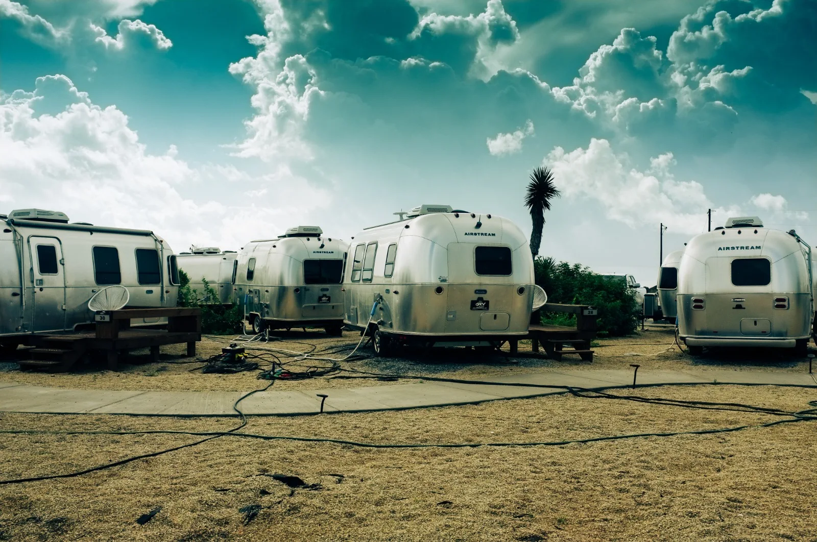 The Airstream trailer village at SpaceX Starbase under a dramatic sky