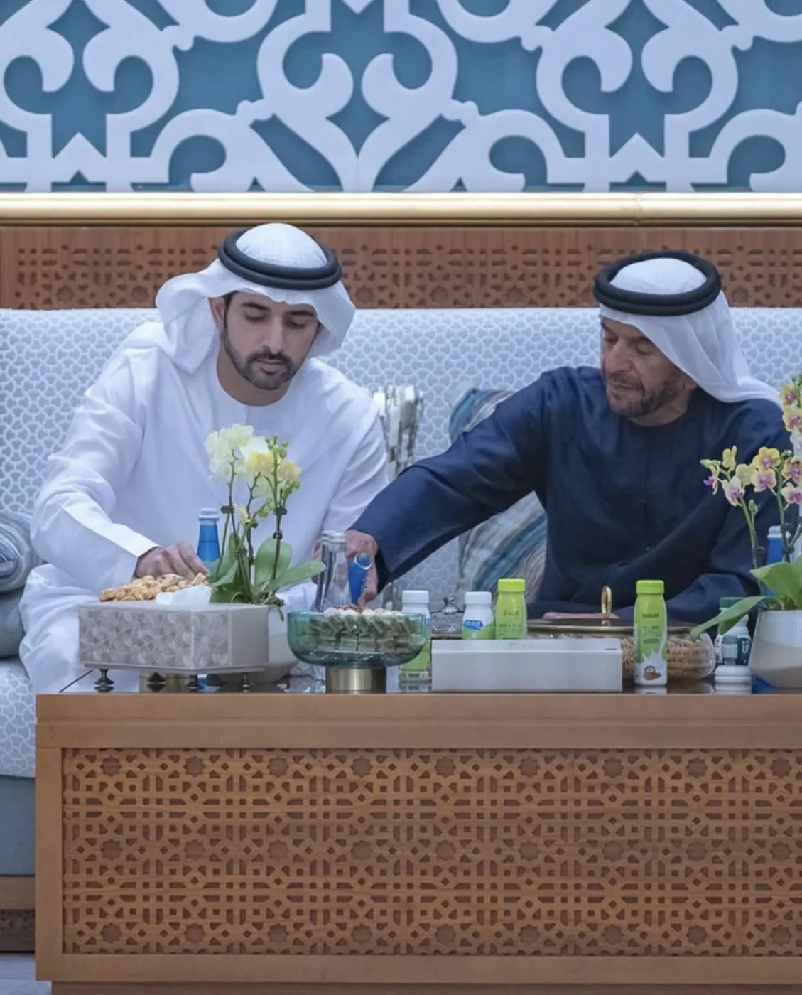 Sheikh Hamdan bin Mohammed bin Rashid Al Maktoum and Sheikh Suroor bin Mohammed Al Nahyan with Ma Hawa bottles on the table