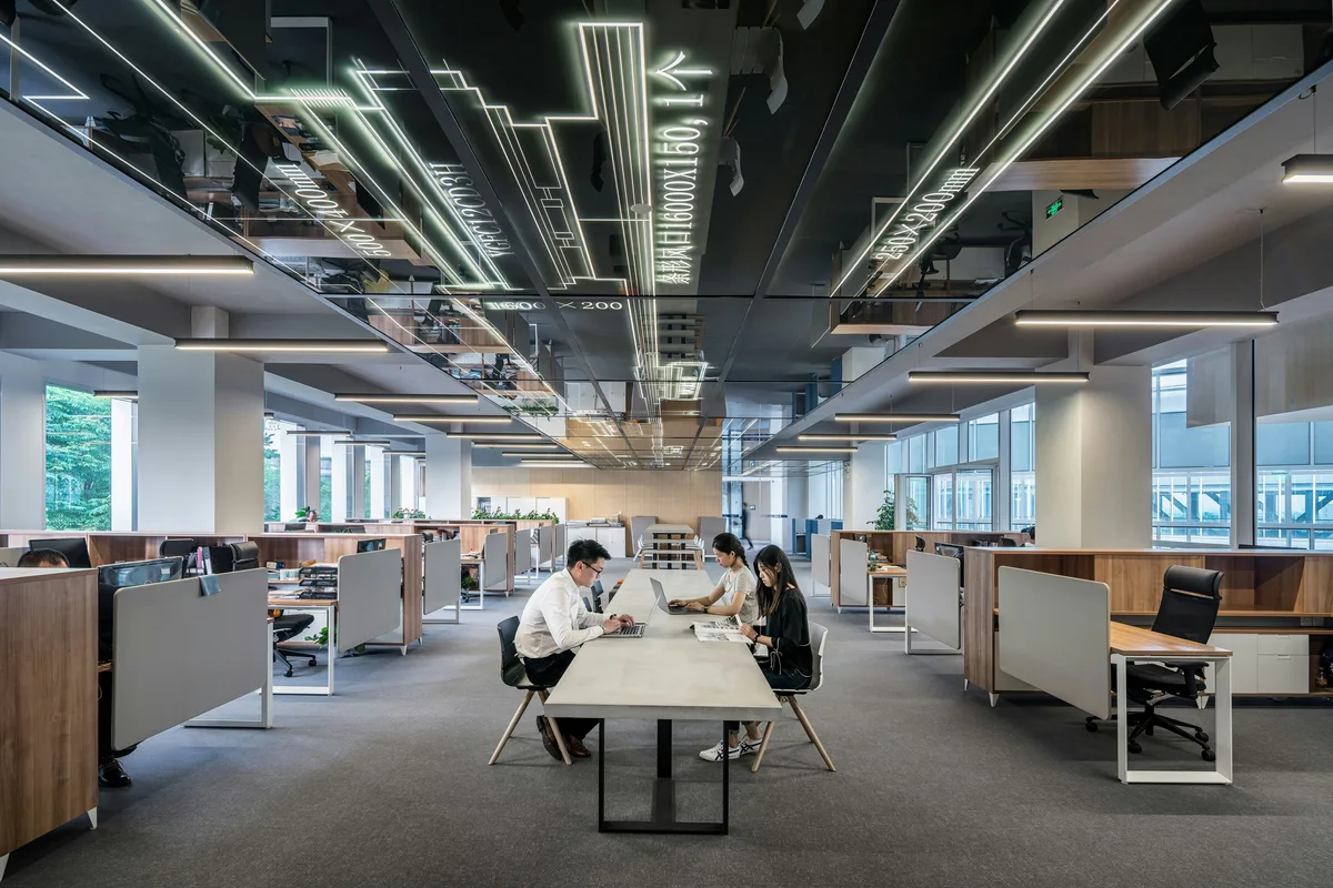 Open-plan corporate office with employees at work