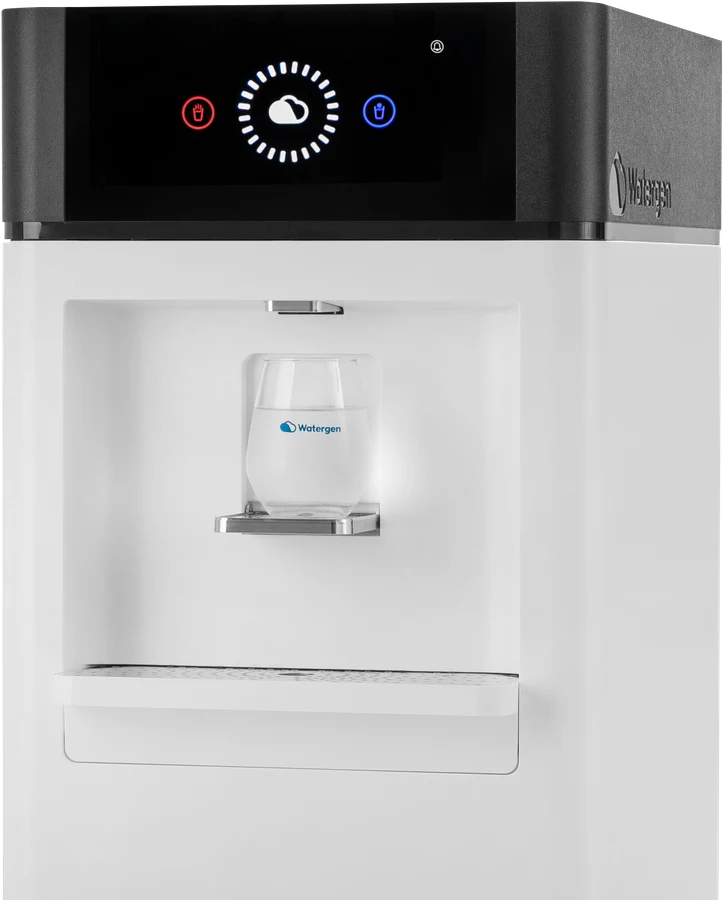 GENNY dispenser close-up with a water glass on the tray