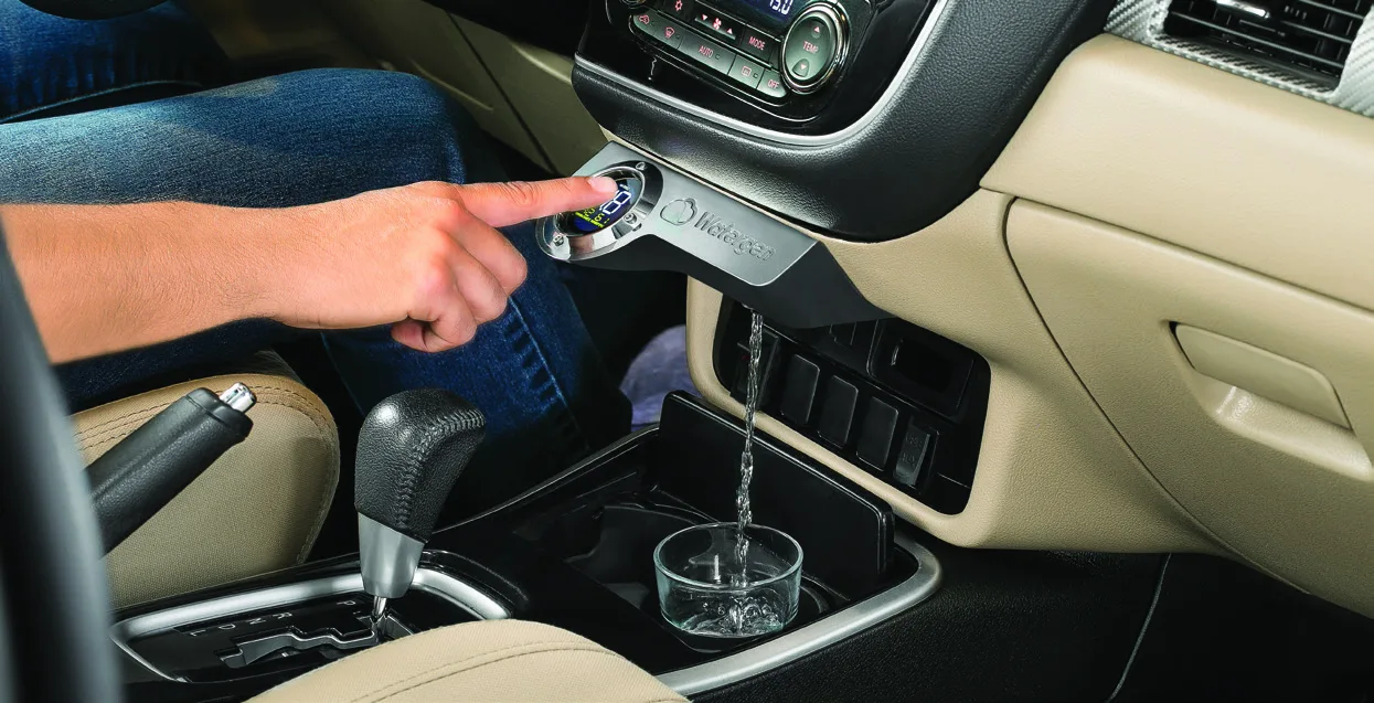 ON Board cabin dispenser pouring a glass of water beside the driver